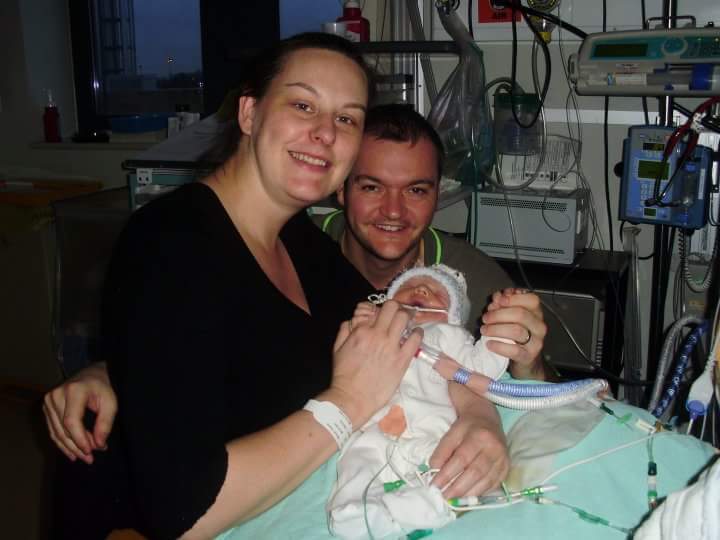 • Claire and Simon Nicholl with their son Harrison after his birth